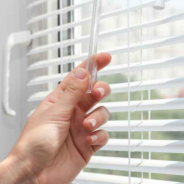 image of Venetian Blinds being secured showing fittings and fixings